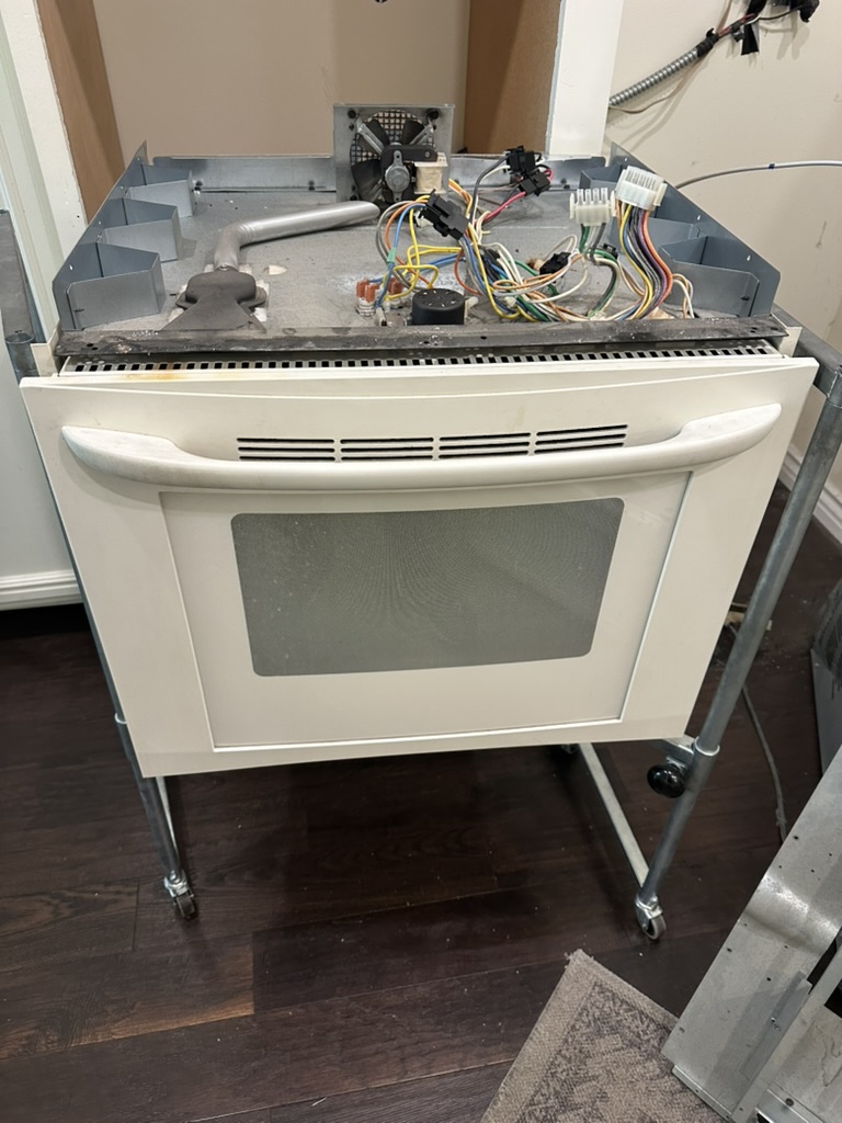 Electric oven during heating-element repair